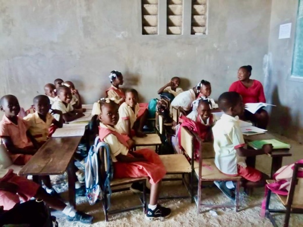 Group of school children at desks
