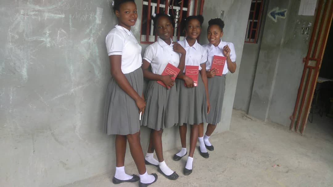 Four school girls in uniform